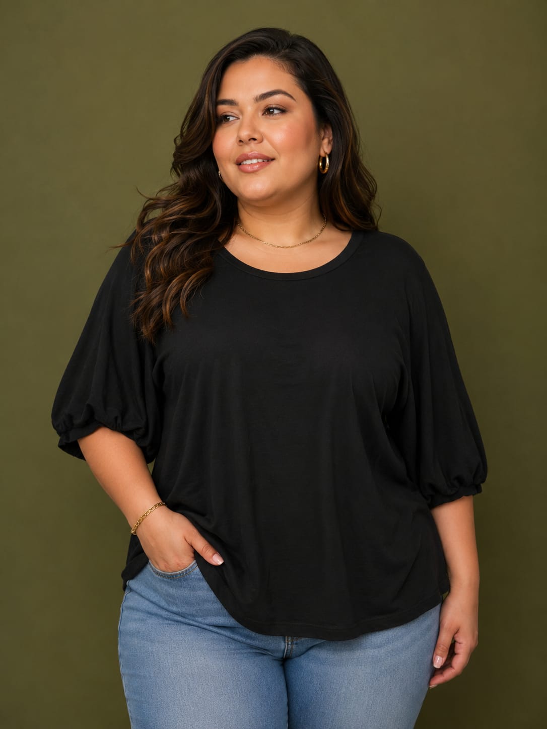 Blusa negra manga bombacha